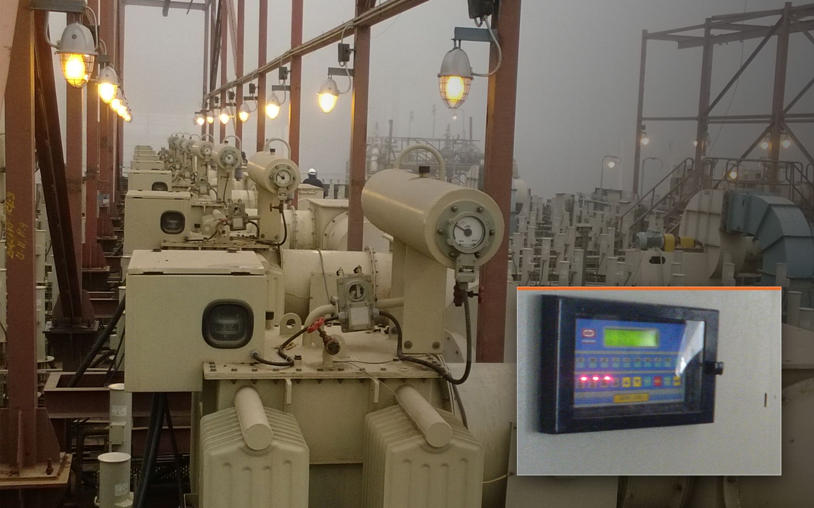 ESP transformer rectifier set installed on the precipitator roof under gantry lighting, with an inset detail of a field controller on the ESP control panel