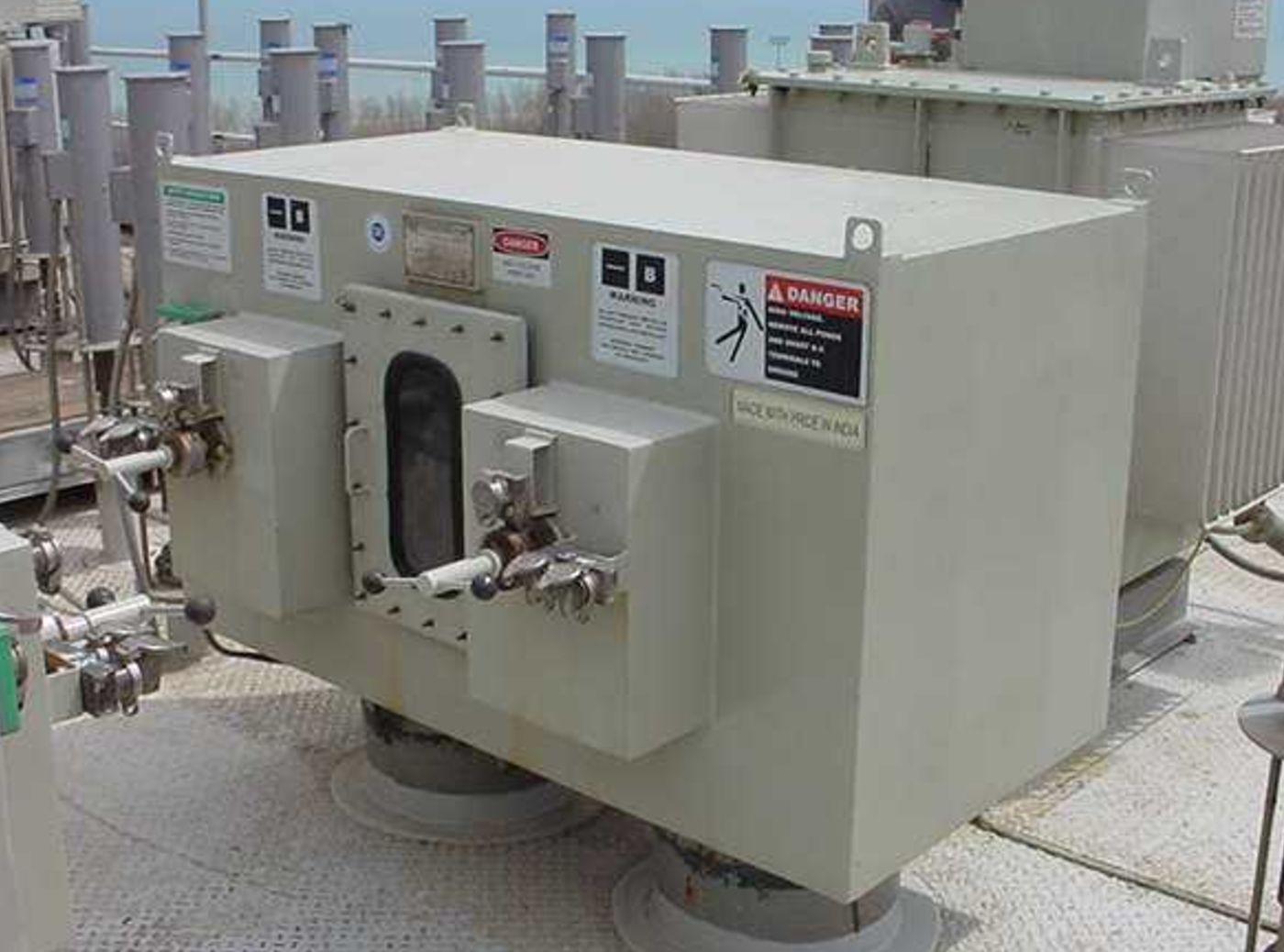 Four position grounding cum isolation switch installed outdoors on an ESP roof alongside its transformer rectifier set