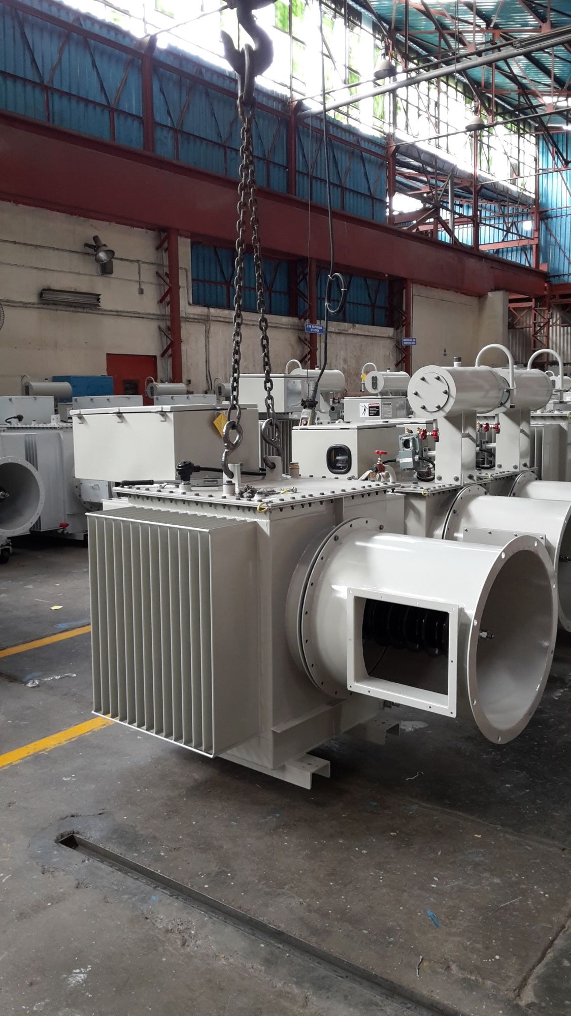 Transformer rectifier set being lifted on the shop floor before despatch