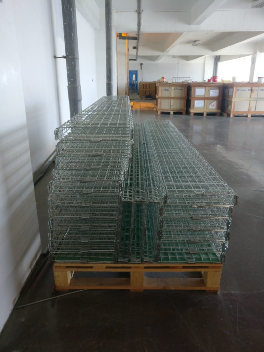 Wire mesh basket cable trays stacked on pallets